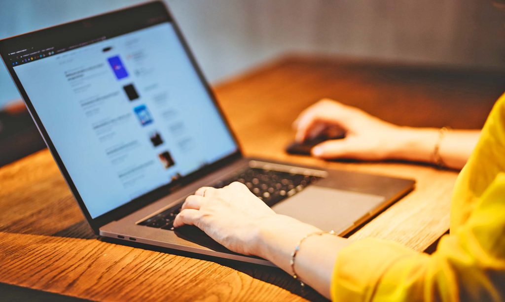 Person Working on Laptop